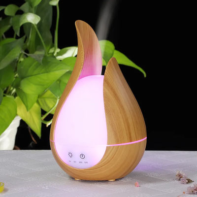 Buen precio Distribuidor de aceite perfumado de control remoto para el hogar de venta al por mayor Humidificación Rociador de niebla fría Difusor de aroma con luz nocturna en línea
