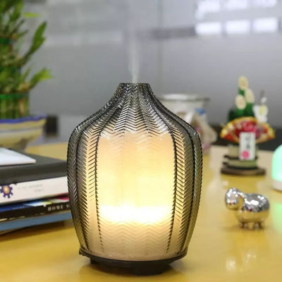 Buen precio Diffusores de aroma ultrasónico Nebulante silencioso Diseño comercial único Máquina de olor de aceite esencial portátil con luz cálida en línea